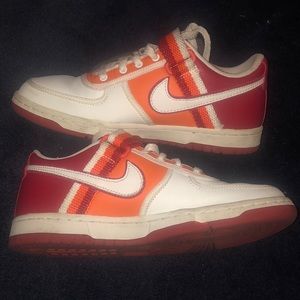 Red white and orange Nike swoosh